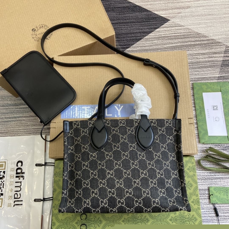 G*u*i shopping bags